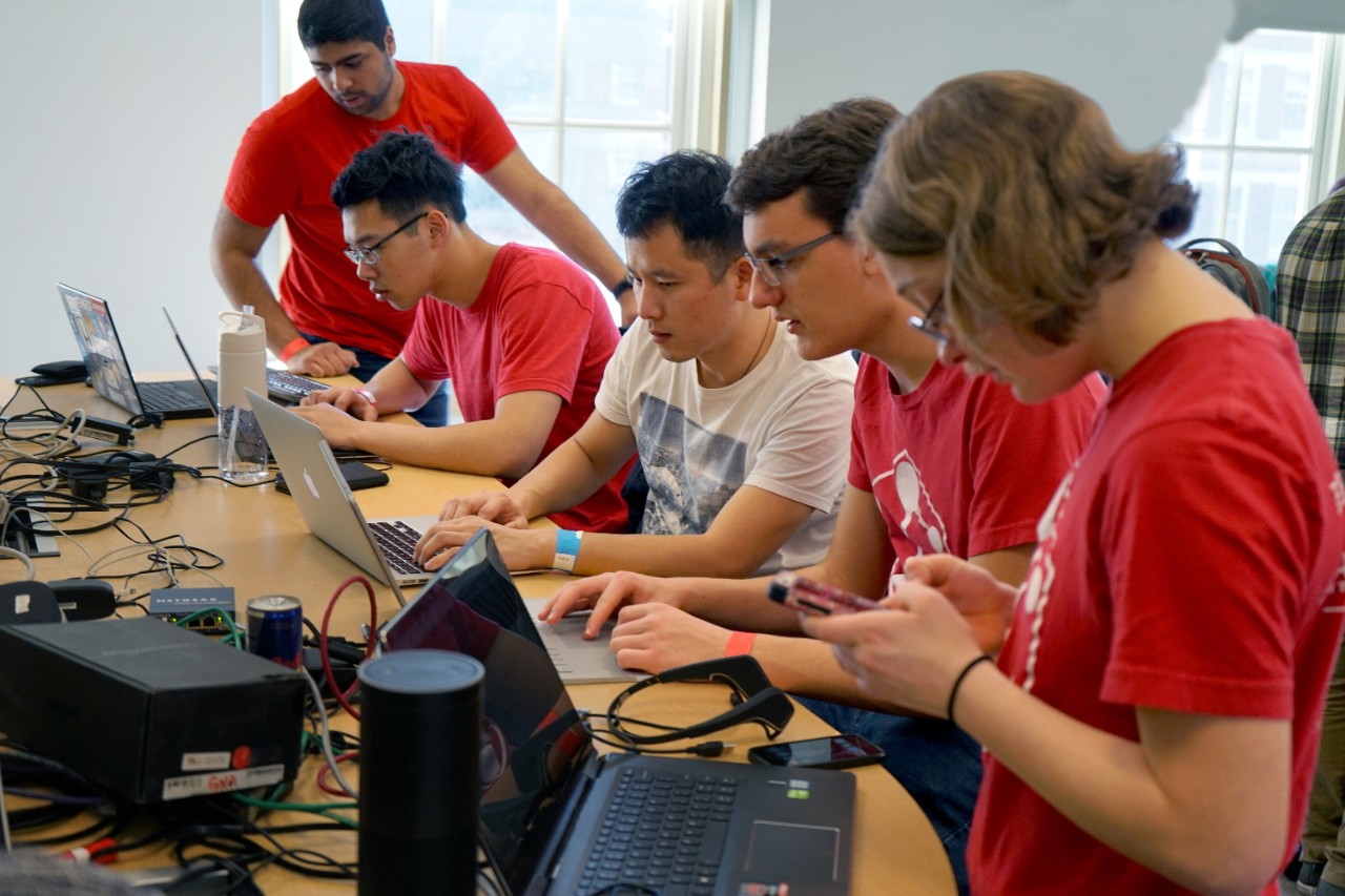Image of computer engineering students at a hackathon.