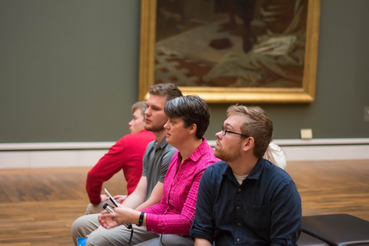 Students and professor at an art gallery in Germany