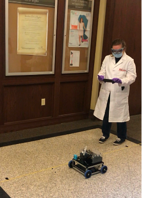 Student working on a car