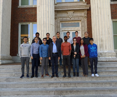 Dr. Shanov's group standing in front of the main entrance of the Baldwin Hall.