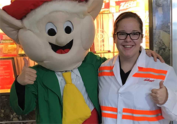 Hannah Carson, chemical engineering class of 2019, pictured with a mascot on co-op at Kellogg's