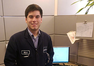 Mitchell Muha, chemical engineering class of 2019, is pictured at his office at Lubrizol Corp.