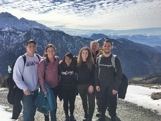 Six UC students pose in the Alps